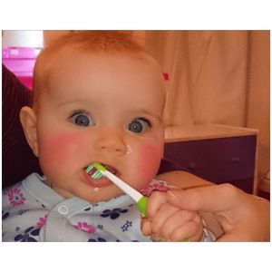 How To Brush Baby's Teeth When They Won't Let You